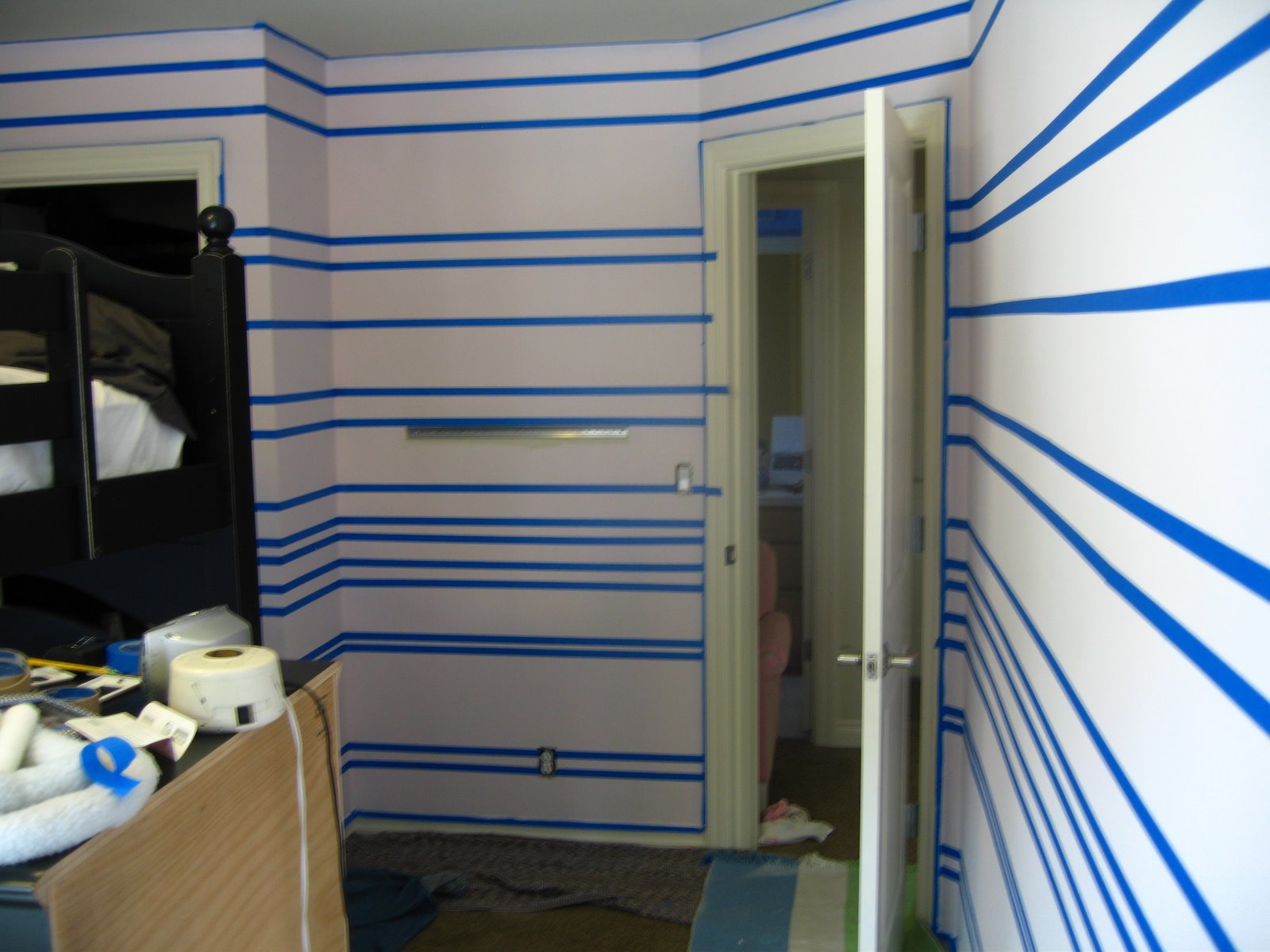 Painting stripes on Dahlia’s walls