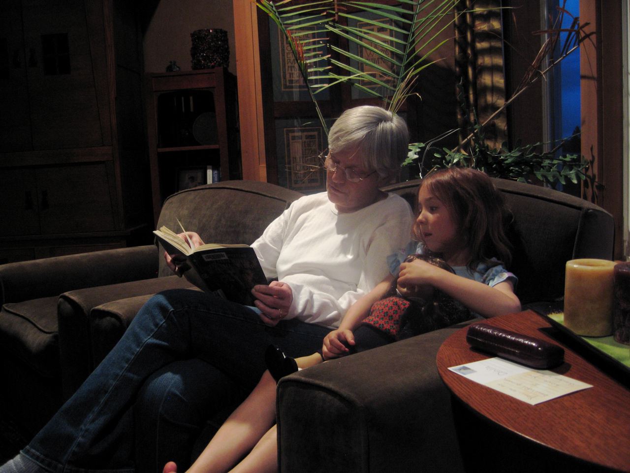 Lulu reads to Monti and Molly