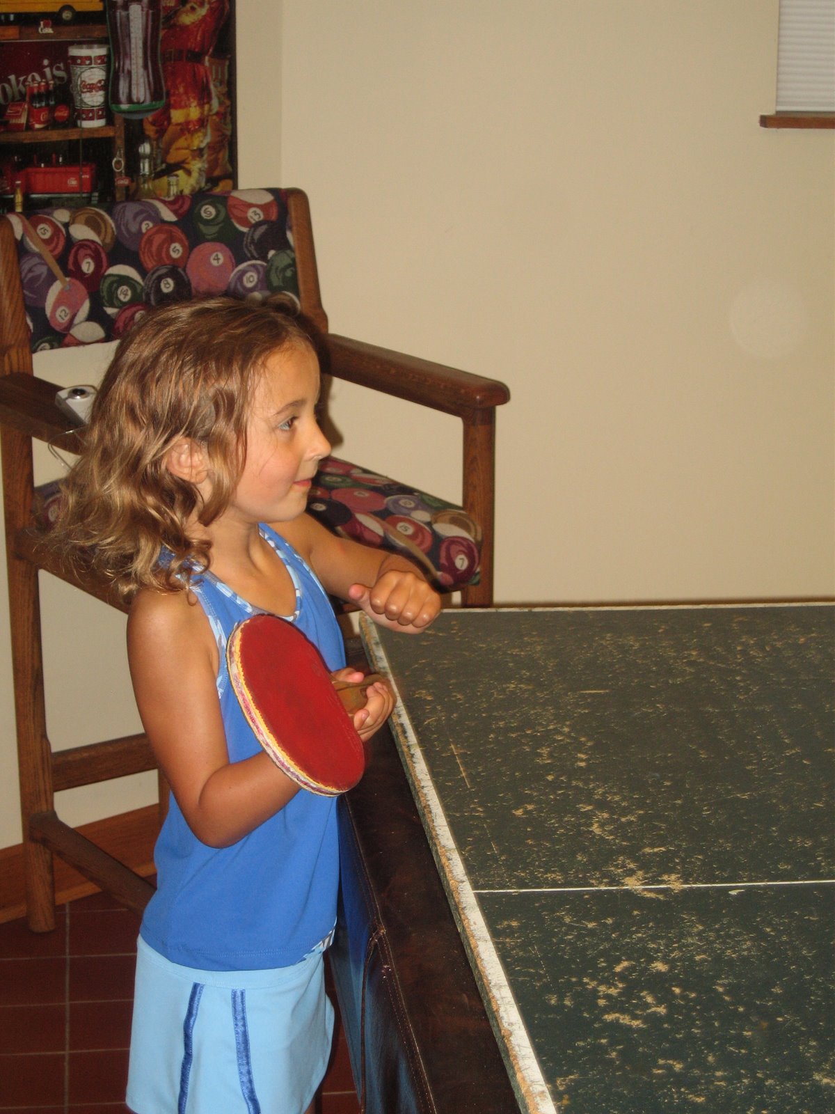 Gabe teaching Monti how to play ping pong