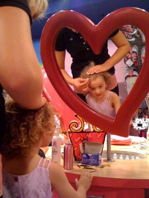 She is not sure about this hairdo.